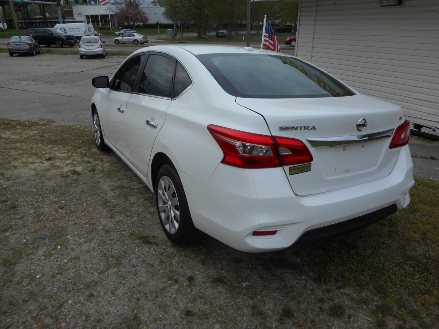 2017 White Nissan Sentra S 6MT (3N1AB7AP9HY) with an 1.8L L4 SFI DOHC 16V engine, 6M transmission, located at 2553 Airline Blvd, Portsmouth, VA, 23701, (757) 488-8331, 36.813889, -76.357597 - Down Payment: $999 Weekly Payment: $110 APR: 23.9% Repayment Terms: 42 Months ***CALL ELIZABETH SMITH - DIRECTOR OF MARKETING @ 757-488-8331 TO SCHEDULE YOUR APPOINTMENT TODAY AND GET PRE-APPROVED RIGHT OVER THE PHONE*** - Photo#7